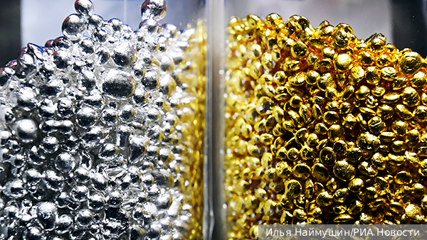 Экономика: Золото и доллар штормит в противоположные стороны